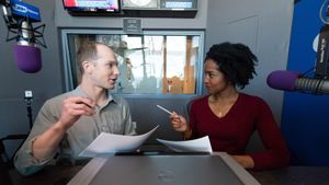 Two hosts of Morning Edition, Paris Alston and Jeremy Siegel
